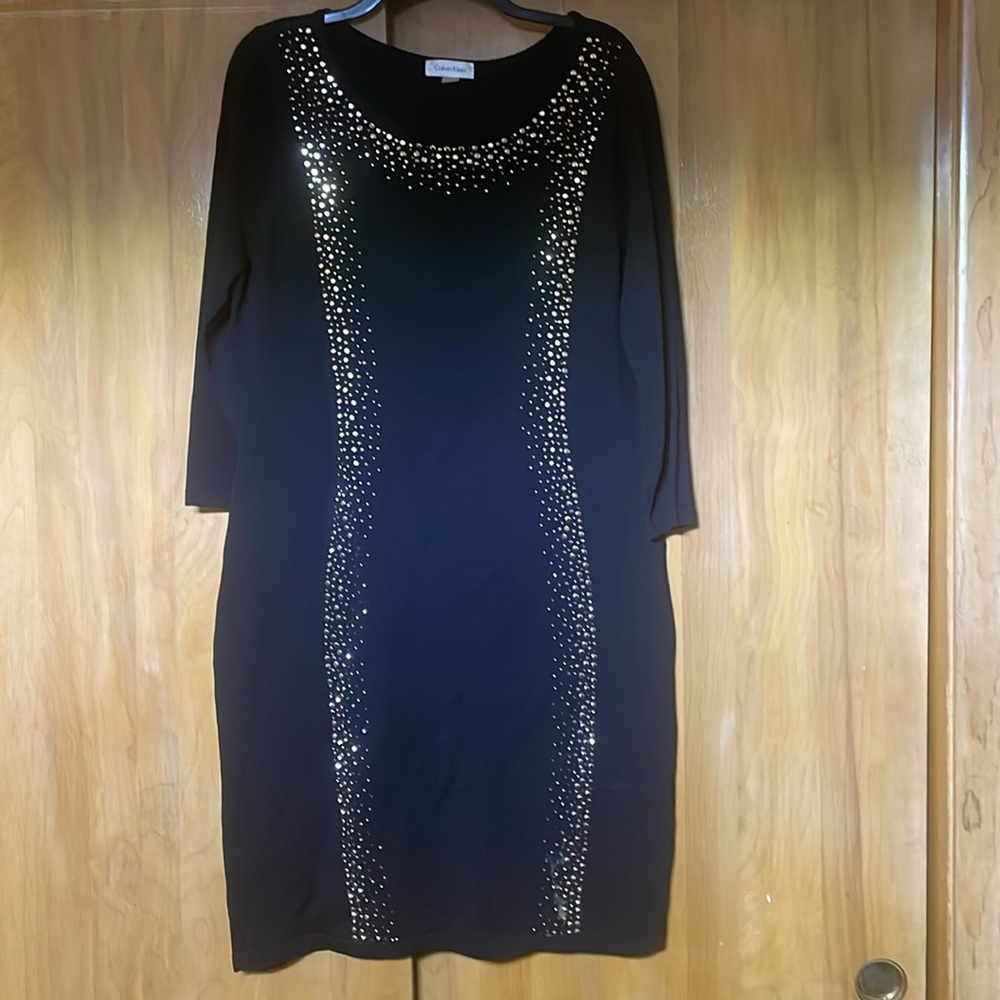Black dress with gold and silver rhinestones nylon/rayon fit body
